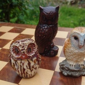 Collection of three ceramic/wooden/resin Owls