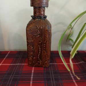 Vintage Textured Leather Covered Spanish Decanter Bottle With Chained Cork.
