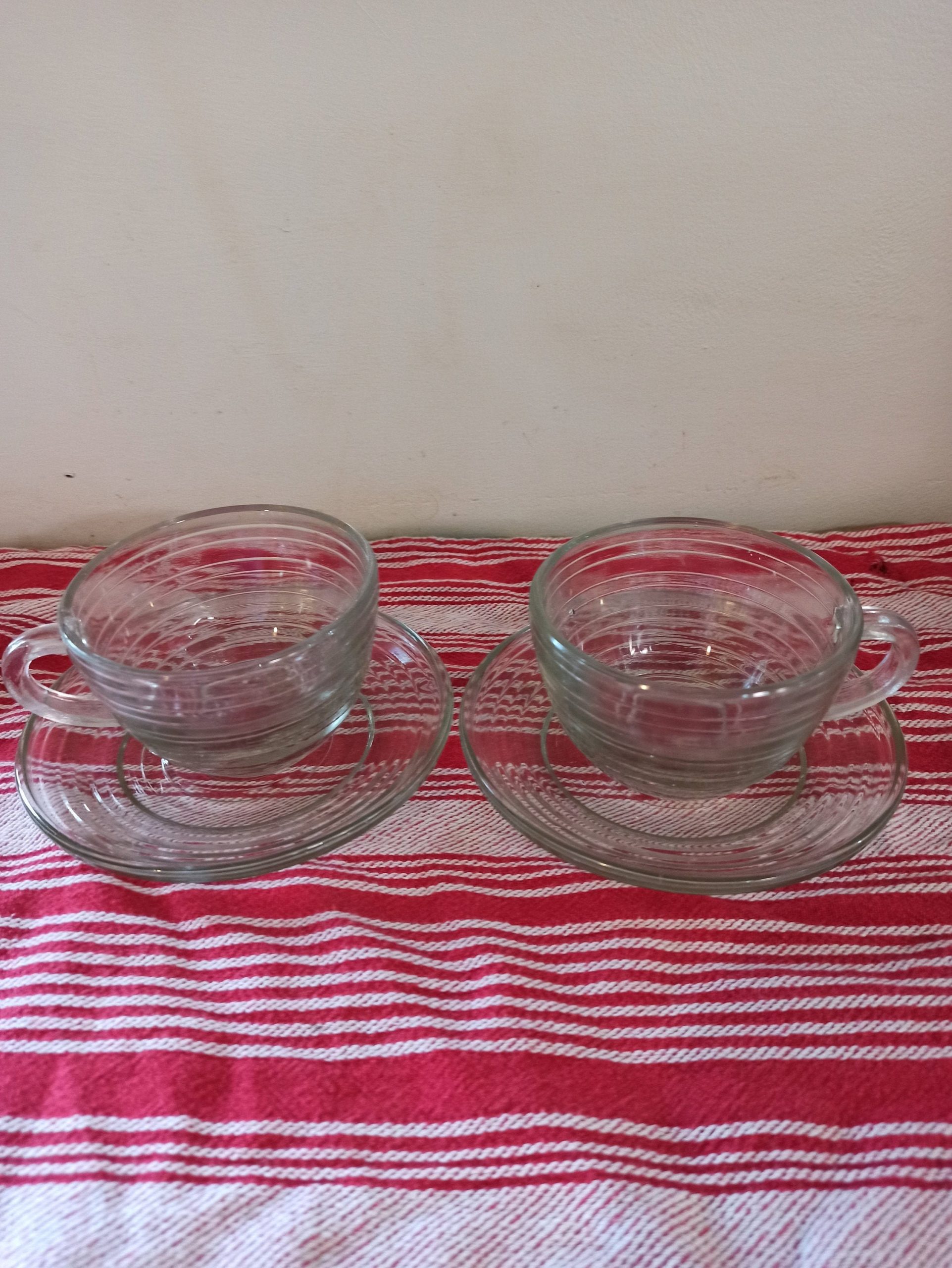 Pair Of Clear Glass Cups With Saucers. Very Good Condition.
