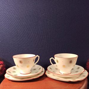 Set of Two Trios of Cups, Saucer and Cake Plate. Bone China.