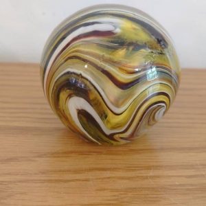 Striped Yellow, Black and White Paperweight.