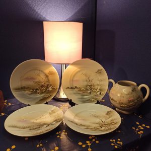 Collection of Four Decorative Plates. All Slightly Different Artwork. Also Including A Small Decorative Twin Handled Jug.