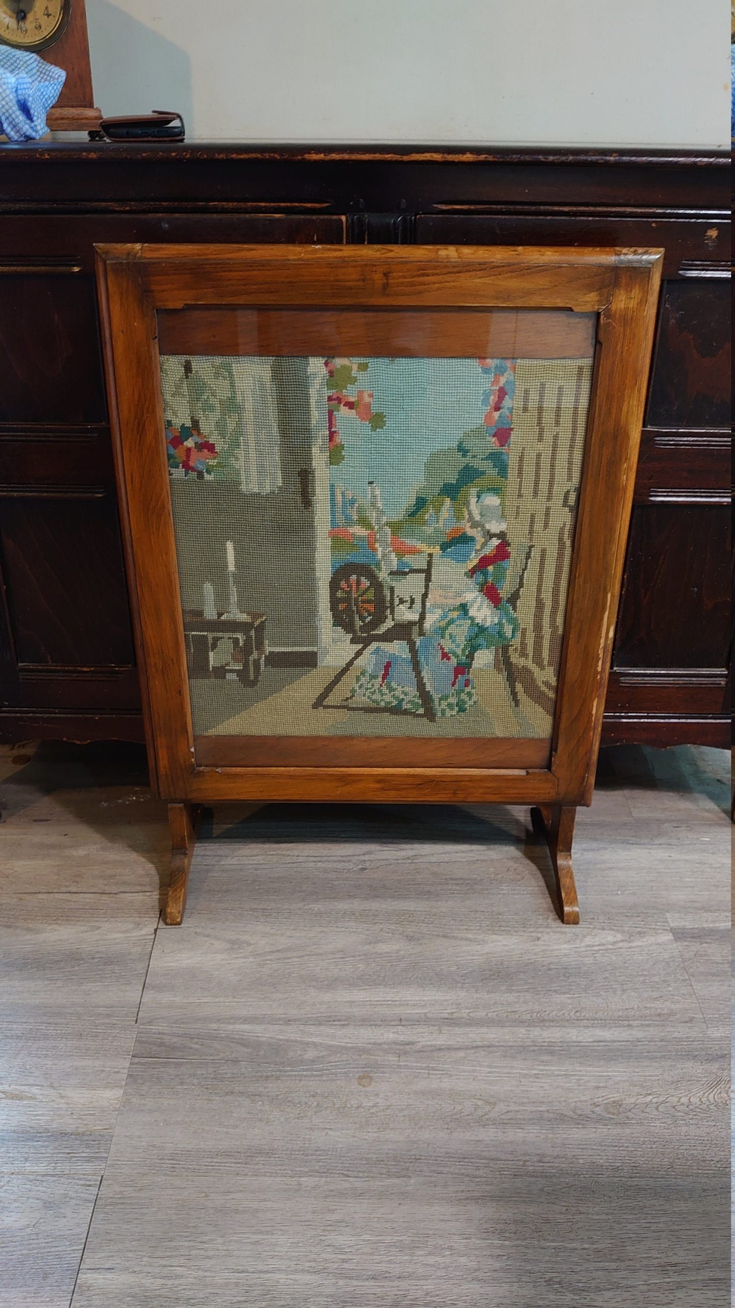 Firescreen with Knitted Scene of Lady on Spinning Wheel c1940s/50s in Very Good Condition