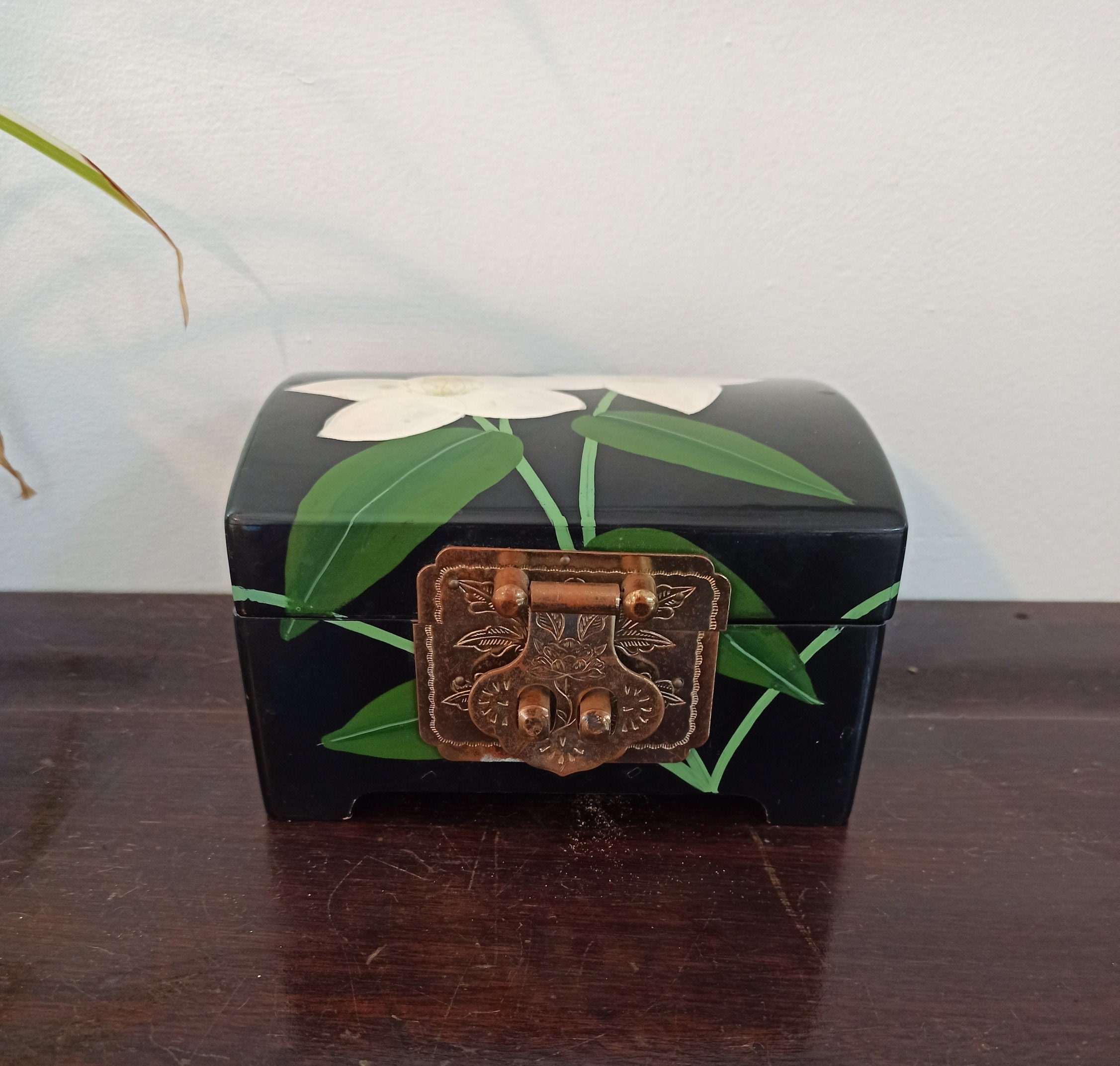 Vintage Jewelery Box. Decorative Wooden Jewelery Box. Heavy with brass Lactch Mechanism. Very Good Condition.