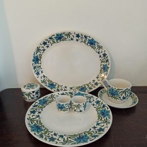 Midwinter Oval Serving Plate, Jam Pot, Cup And Saucer, Egg Cups and Dinner Plate.