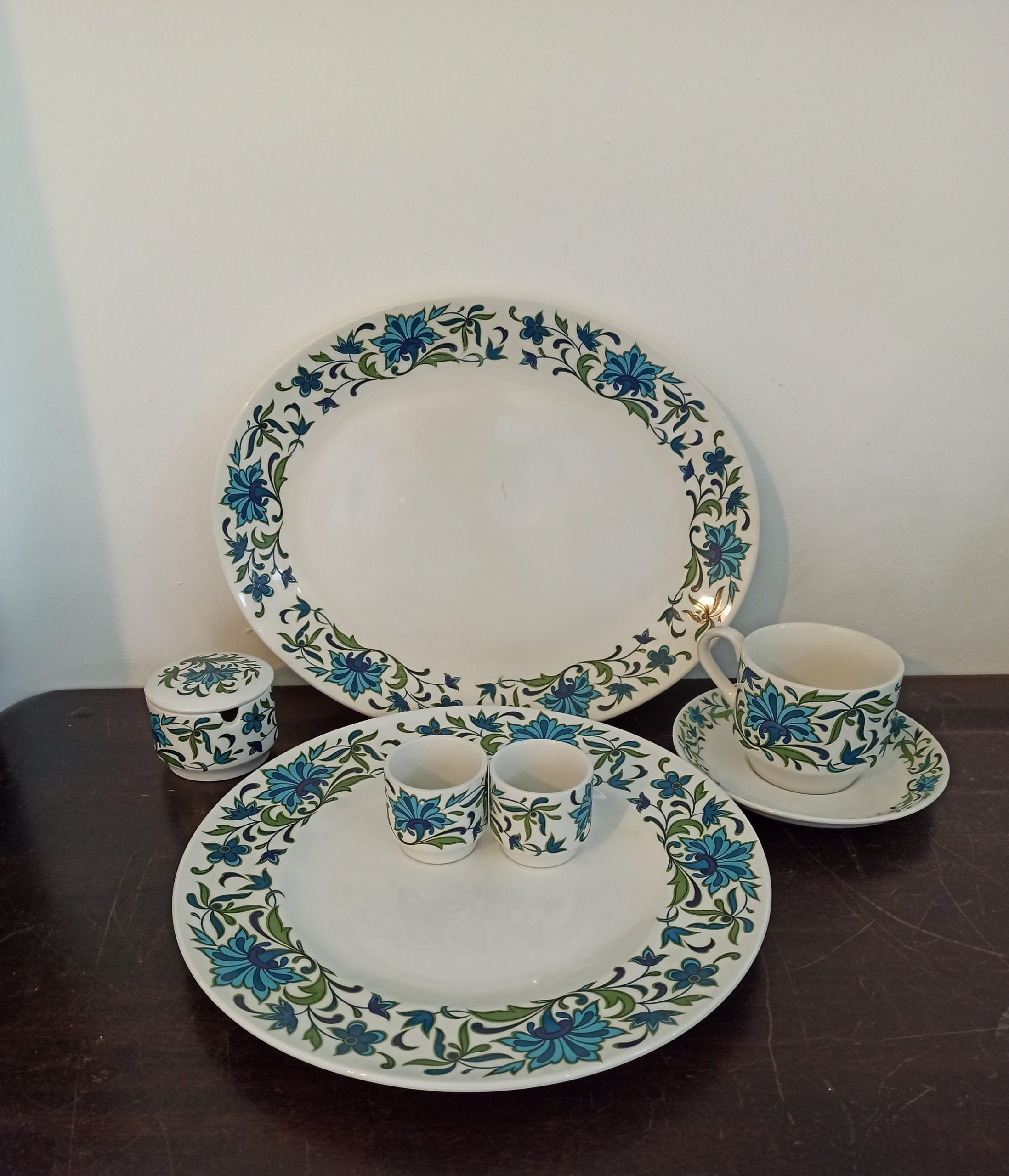 Midwinter Oval Serving Plate, Jam Pot, Cup And Saucer, Egg Cups and Dinner Plate.