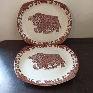 A Pair of Decorative Meat Plates. Bull. Ironstone.
