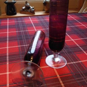 Two Red and Gold banded Glass Champagne Flutes