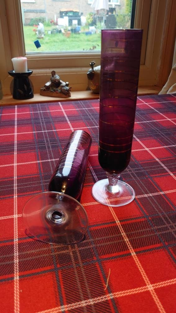 Two Red and Gold banded Glass Champagne Flutes