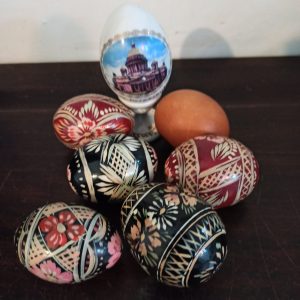 A Collection of Wooden And Procelain (St. Petersberg) Decorative Eggs. 7 In Total.