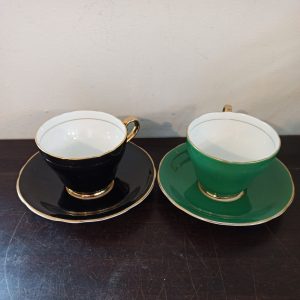 Two Edwardian Cups and Saucers, Black and Green With Gold Edge - Bone China