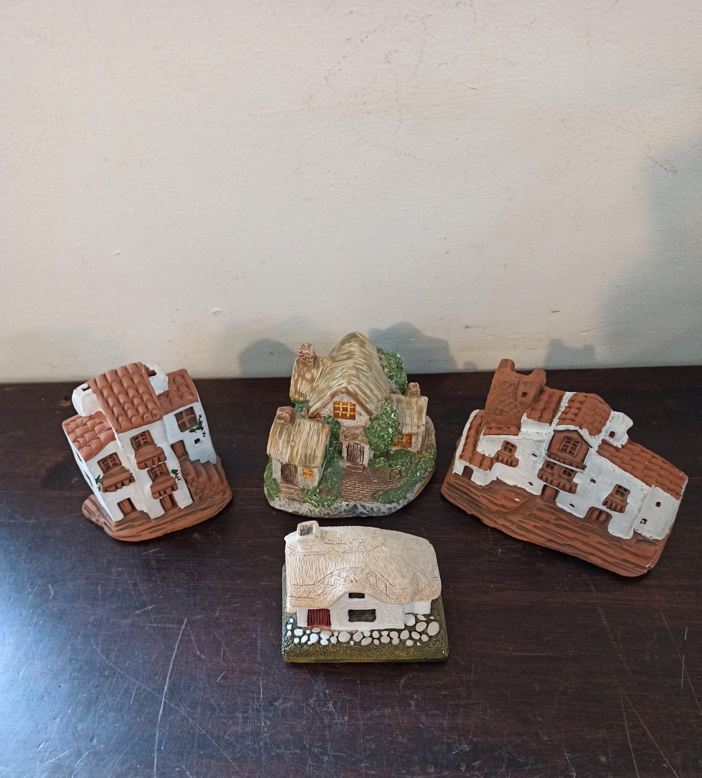 A Collection of 4 Model Buildings. Very Good Condition. One Lilliput Lane. Woodcutters Cottage (1983)