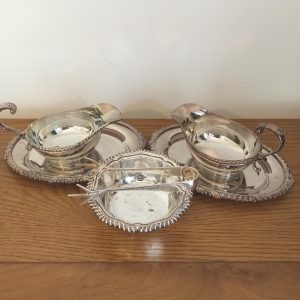Silver Plated Sauce Boats with Stands And Sugar Bowl with Tongs.