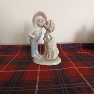 Woolbro Boy and girl figurine. Made In China.