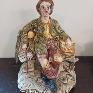 Capodimonte Tramp on Bench Ornament / Figurine. Good Overall Condition.