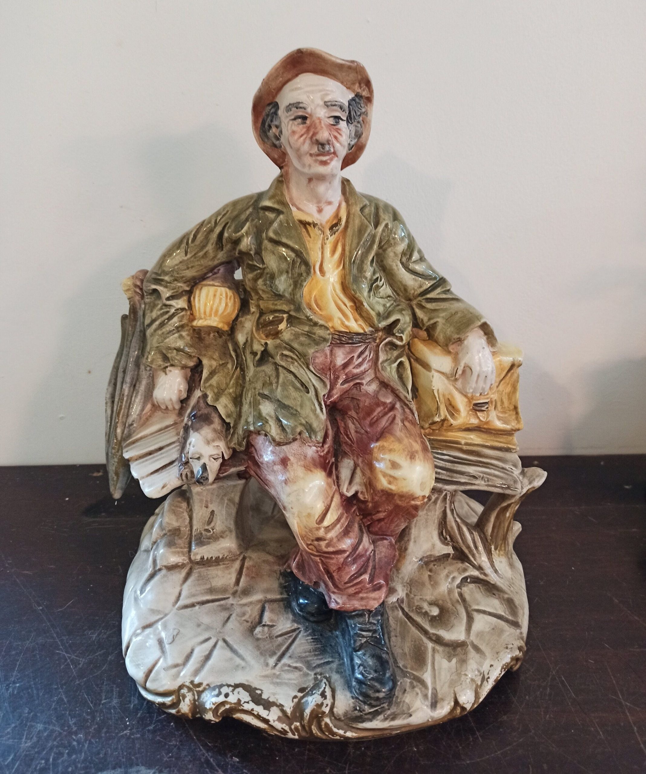 Capodimonte Tramp on Bench Ornament / Figurine. Good Overall Condition.