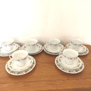 Set of 6 Cups, Saucers and Side Plates. Floral. Bone China. Green pagoda Mark. Good Condition.