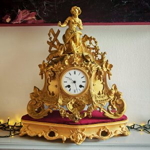 Antique 19th Century Gilt Ormolu Pendulum Clock with Gilded and Burgundy Velvet Base. Restored.