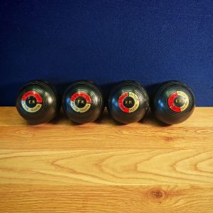 Four Vintage Henselite FR Super Grip Lawn Bowls, 4 15/16 Bias - 1970s, 1980s Vinyl or Composite - Very Good Working Condition