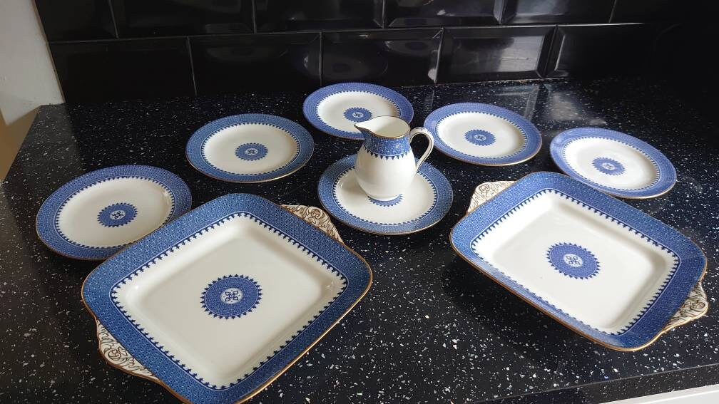 Wedgwood Part Dinner Set including, Sandwich Plates, Milk jug and Side plates.
